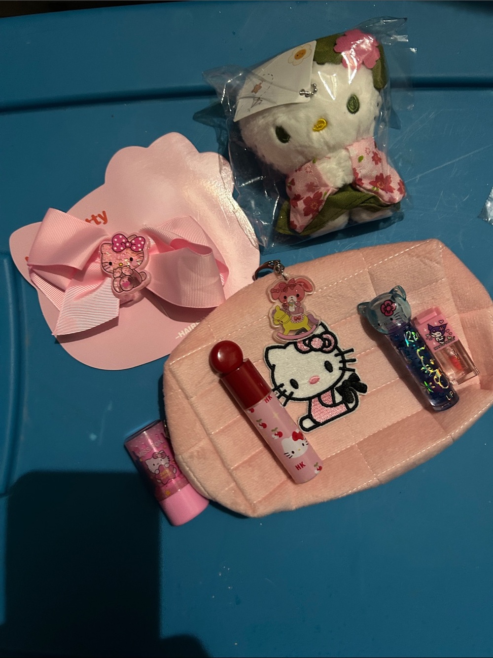 Hello Kitty Pink Accessory Pouch with Plush and Hair Bow with lip gloss 8 pieces